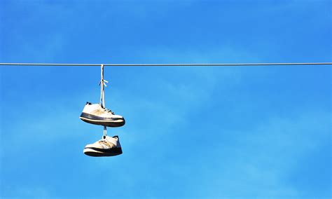 tennis shoes on power lines.